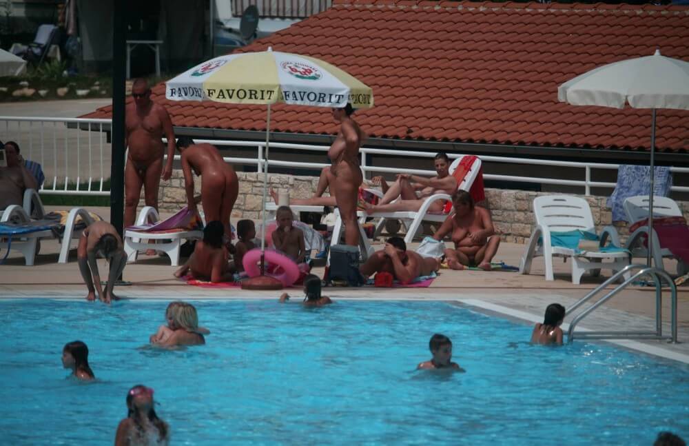 Naturist Pool Observation pics - Blending in with the crowd of nudists