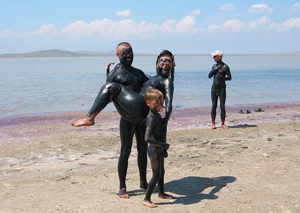 Dark Mud And Clear Water pics - People practice nudism to achieve harmony with nature