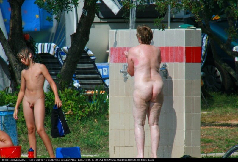 Covered in Towel Nudists-Boardwalk Biking - Family naturism in the modern world