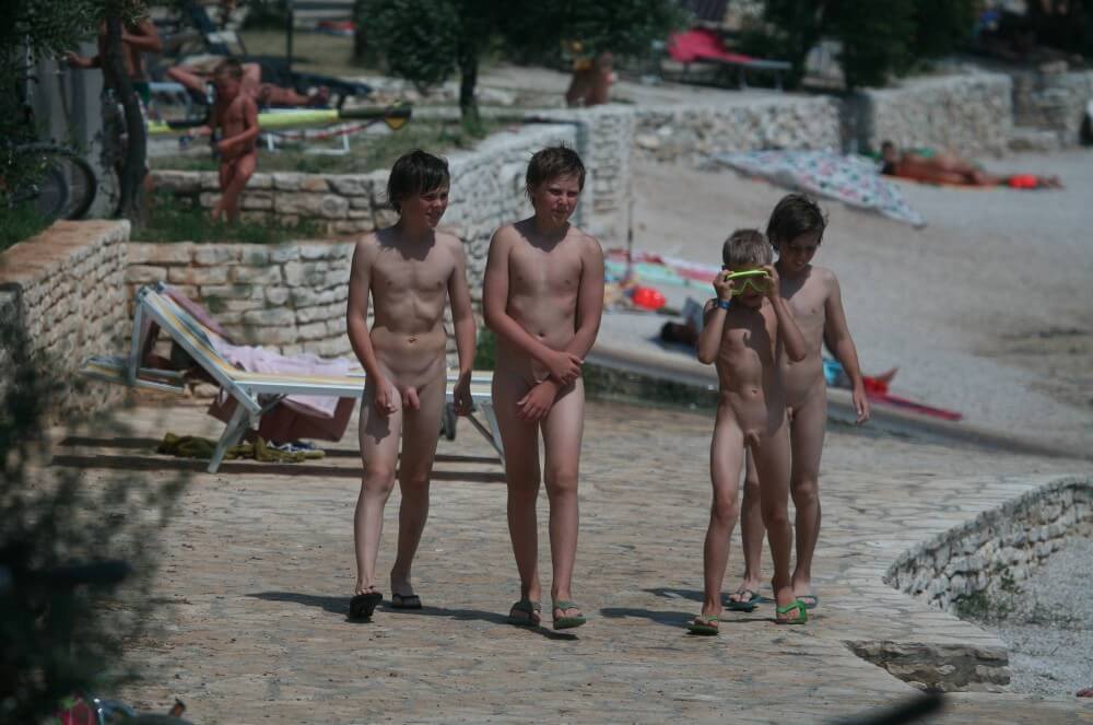 Shore walking nude - Naturists value a simple life