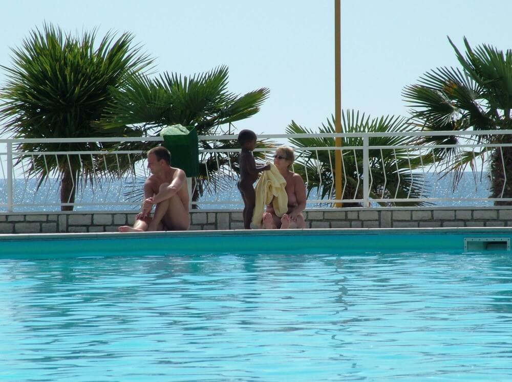 Photo of naturists in an outdoor pool - The entire upper aristocracy practiced nudism