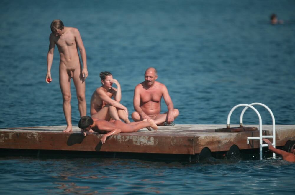 Naturist Family Water Slab pics - Taking Off Ones Clothes
