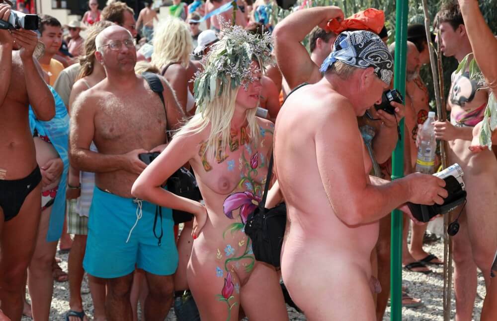 Neptune Painting Couple pics - Most nudists are motivated solely by a sense of comfort